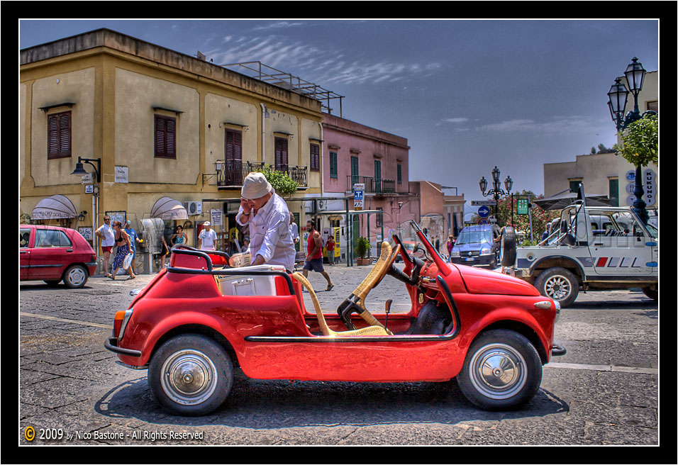 Ustica PA "La Cinquecento cabriolet - The red Fiat car 500" - Elaborazione grafica in HDR, High Dynamic Range